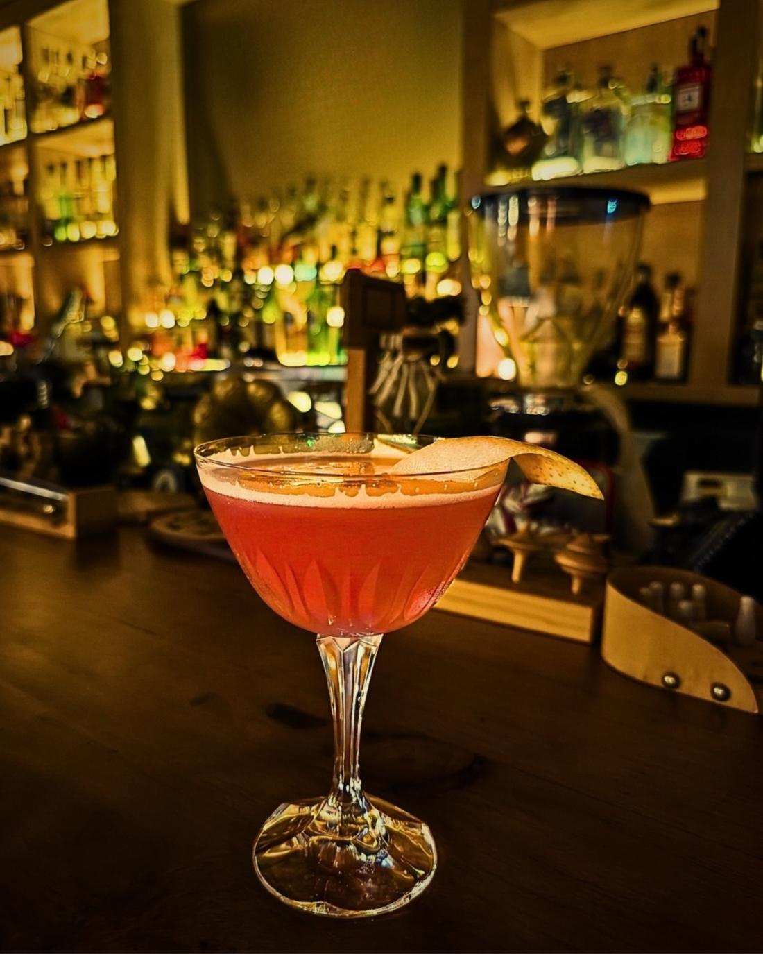 Coupe cocktail at the back bar